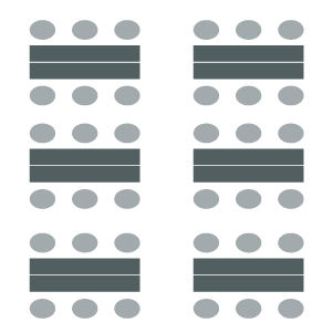 Three tables pushed together to create a larger space to seat up to eight. 