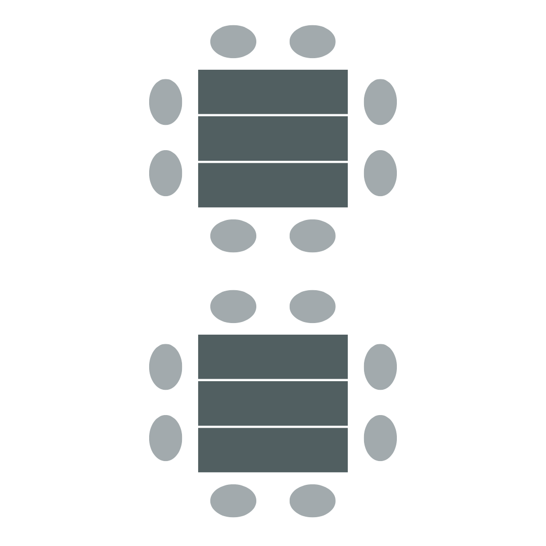 Three tables pushed together to create a larger space to seat up to eight. 