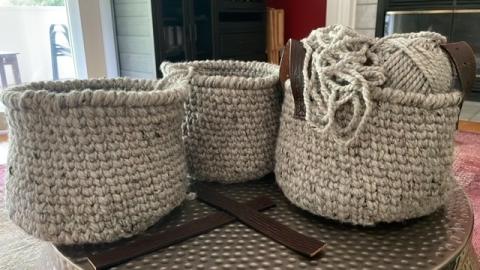 set of three hand crocheted baskets