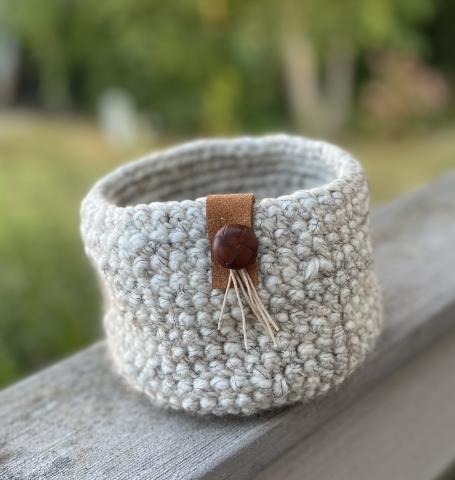 Natural crochet basket with leather tag