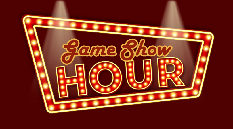 The words Game Show Hour on a lit-up marquee with spotlights shining onto it