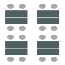 Two tables pushed together to create a larger space to seat four. 